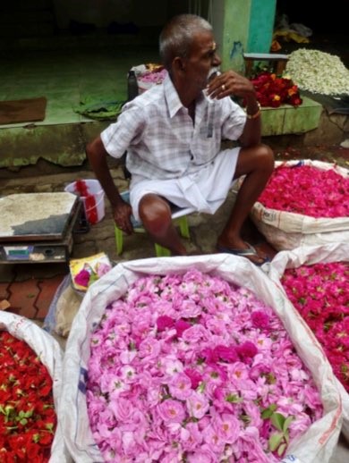 A vendor at the flower market in madurai. Photo credit: wouter r