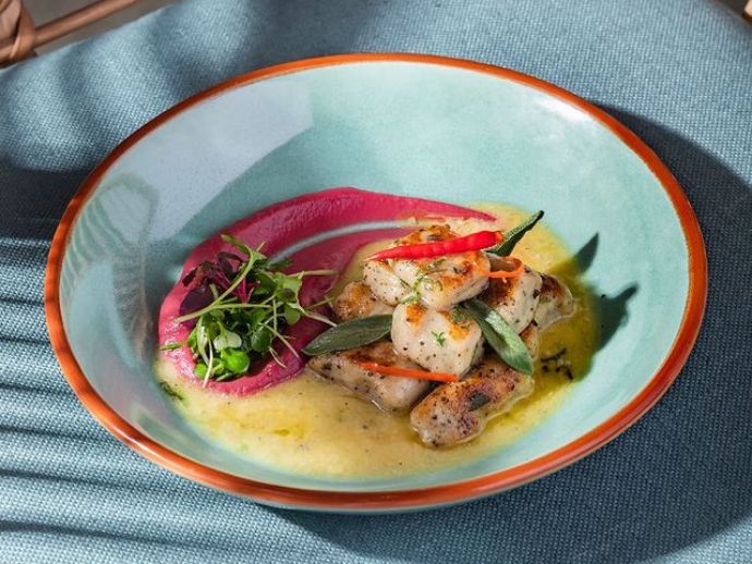 Herbed gnocchi with aubergine puree and sage butter at la poz unlocks the perfect kind of comfort meal.