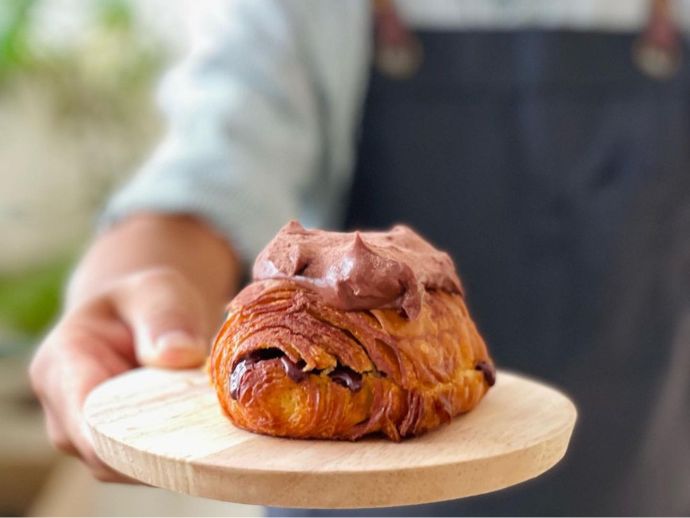 Croissant served fresh and flaky at araku coffee.