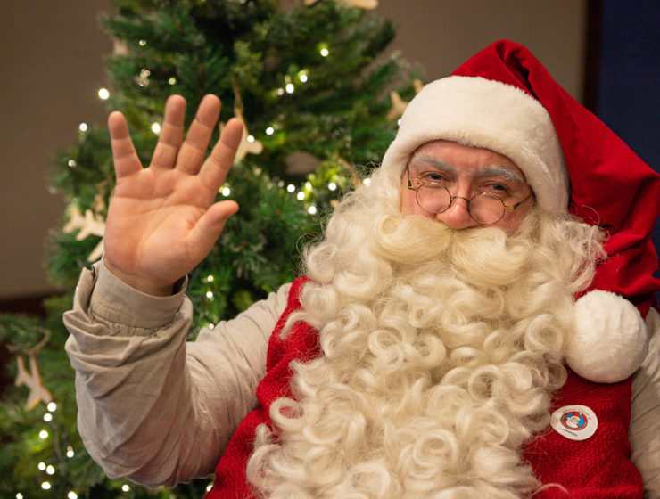 Santa claus visits india on his official airline finnair.  